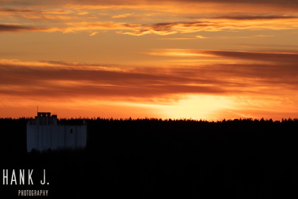 Grain silo at sunset