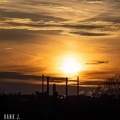 Sunset over paper factory