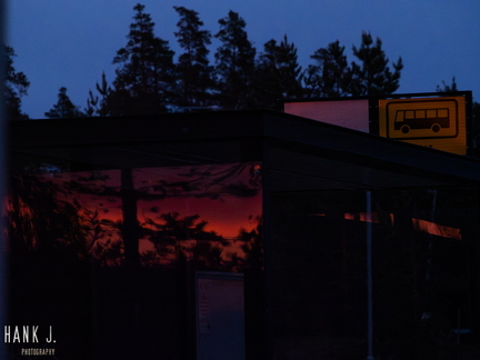 Bus stop at sunset